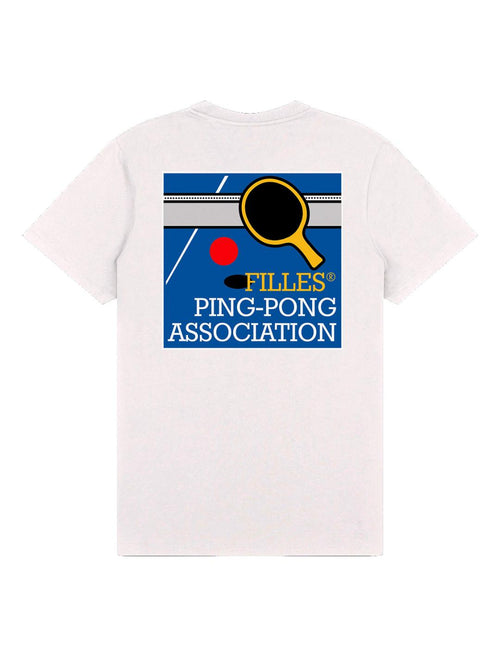 A white short-sleeve t-shirt shown flat against a white background, featuring a blue, yellow, and red graphic on the chest that reads 'FILLES PING-PONG ASSOCIATION' with a ping-pong paddle and ball illustration.