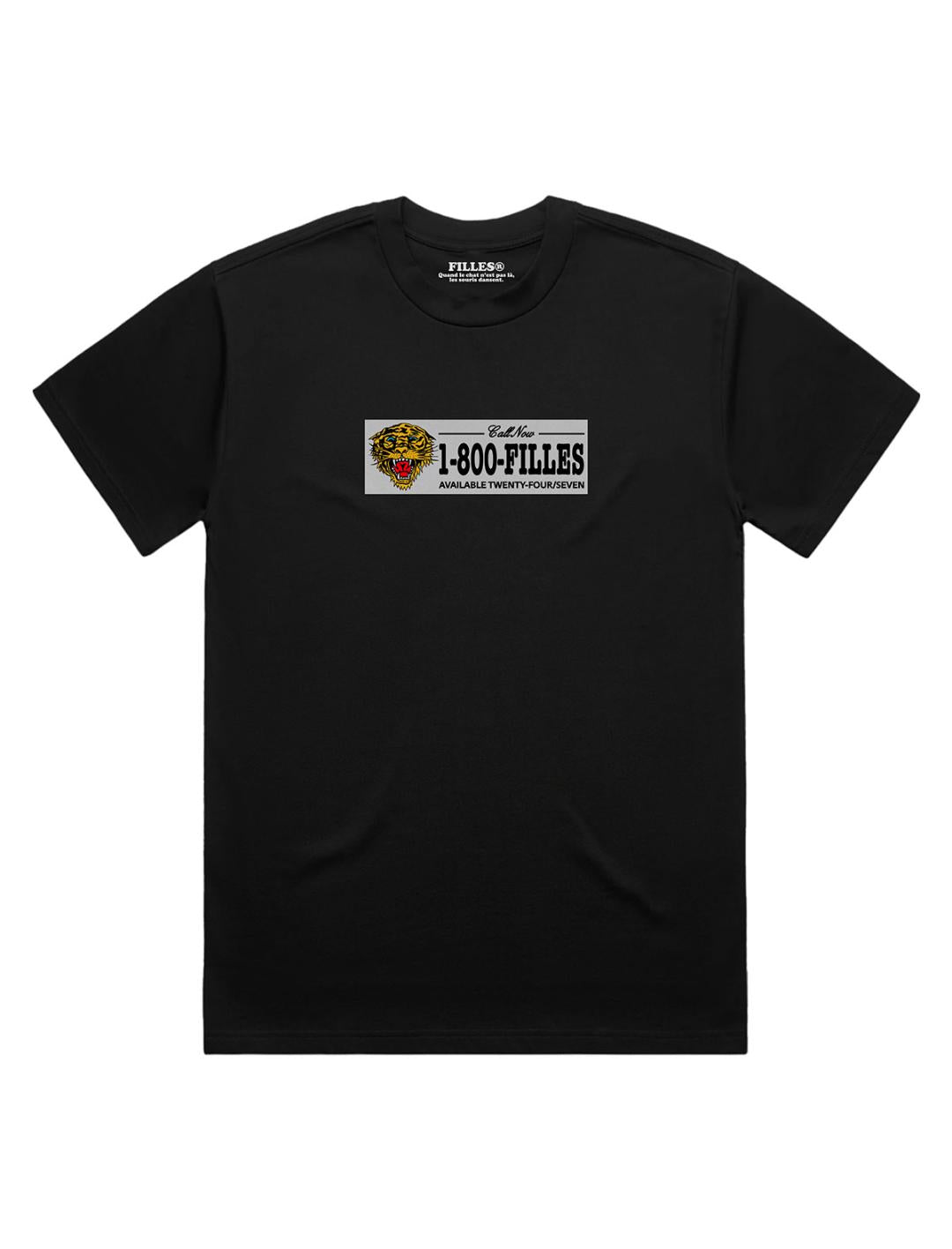 A black short-sleeve crewneck t-shirt featuring a rectangular graphic print on the chest with a tiger illustration and the text 'I-800-FILLES'.